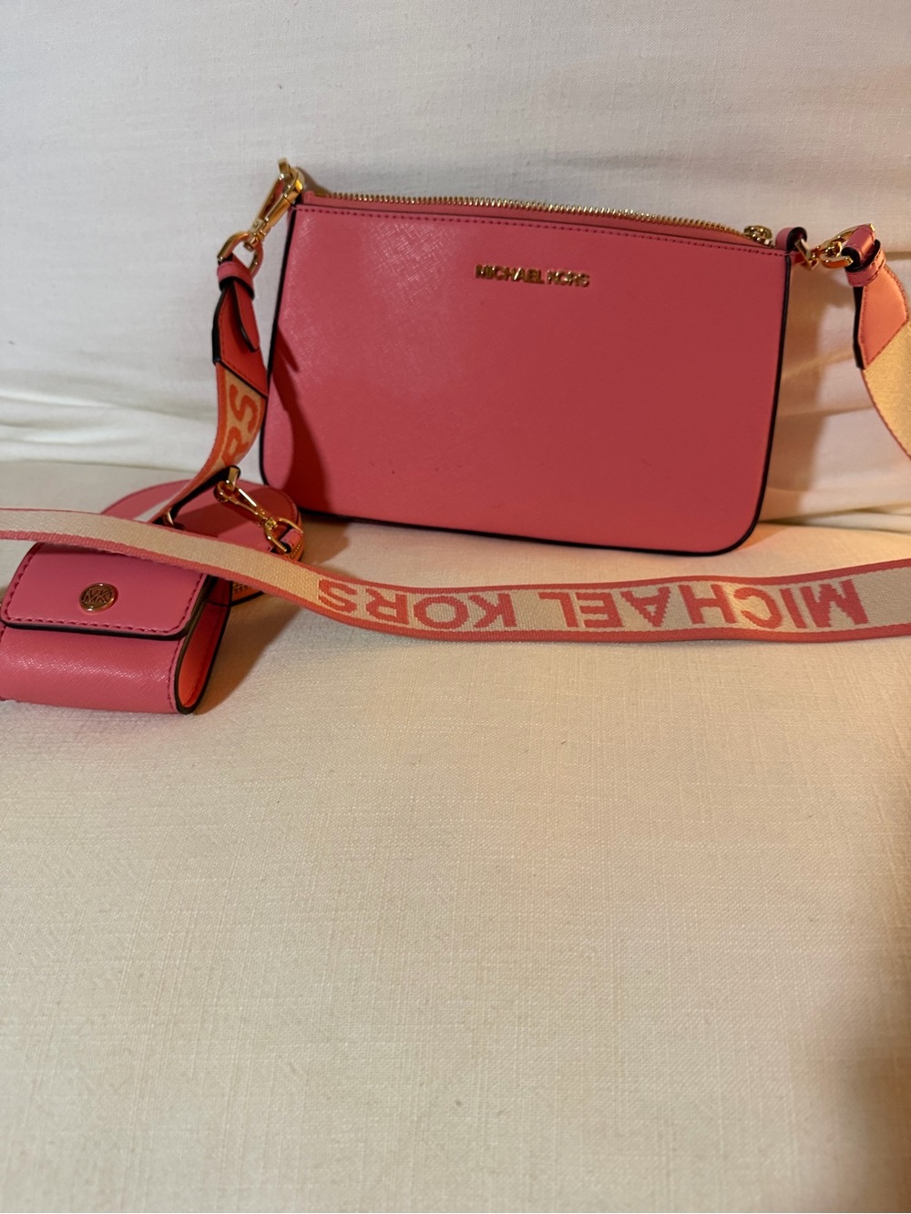 Michael Kors Coral Pink Crossbody with Branded Strap
